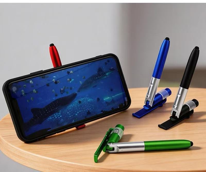Multi Function Toy Pen 4 in 1  - огляд і ціна Phone Stands